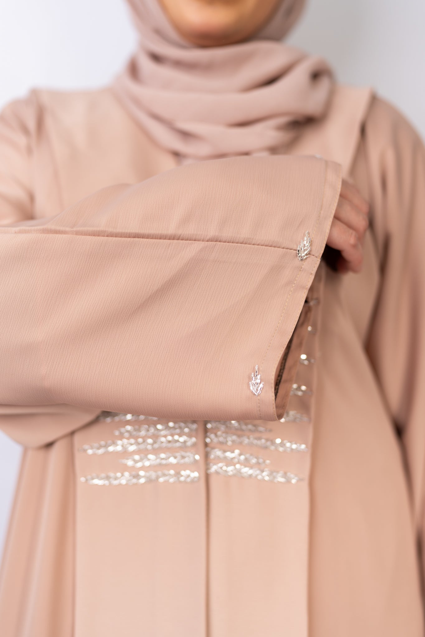 Exquisite Beige Zoom Fabric Abaya with Crystal Bead Handwork & Flowy Sleeves